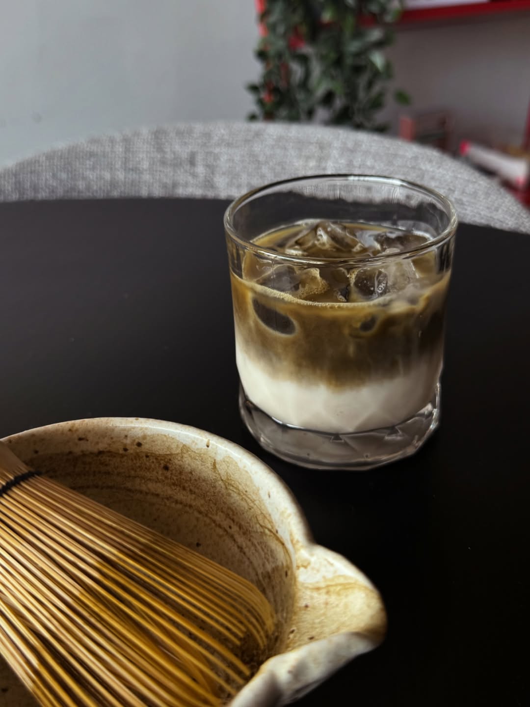Iced Hojicha with bamboo whisk